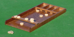 Mini sjoelbak met schijven
